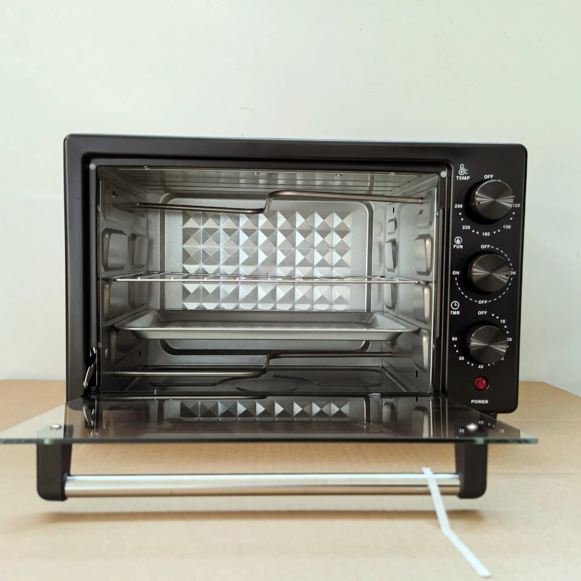 12L household electric oven in black with double-layer interior and mechanical dials, galvanised steel body
