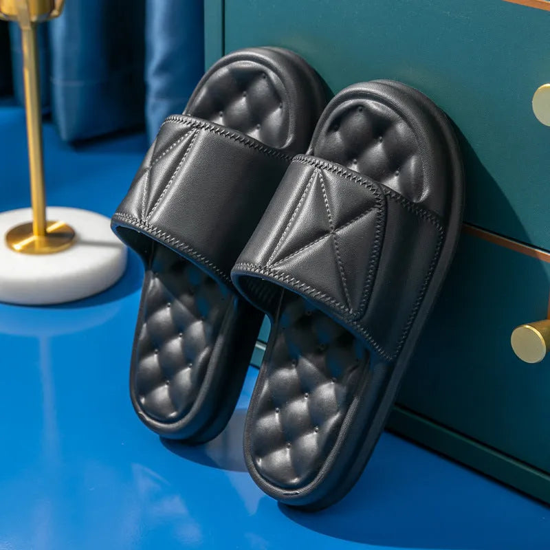 A pair of thick-soled EVA foam bath sandals in a chosen colour, showing the non-slip sole pattern.