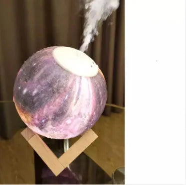 Lunar humidifier night light with spherical design, 13cm diameter, showing LED lighting and water tank