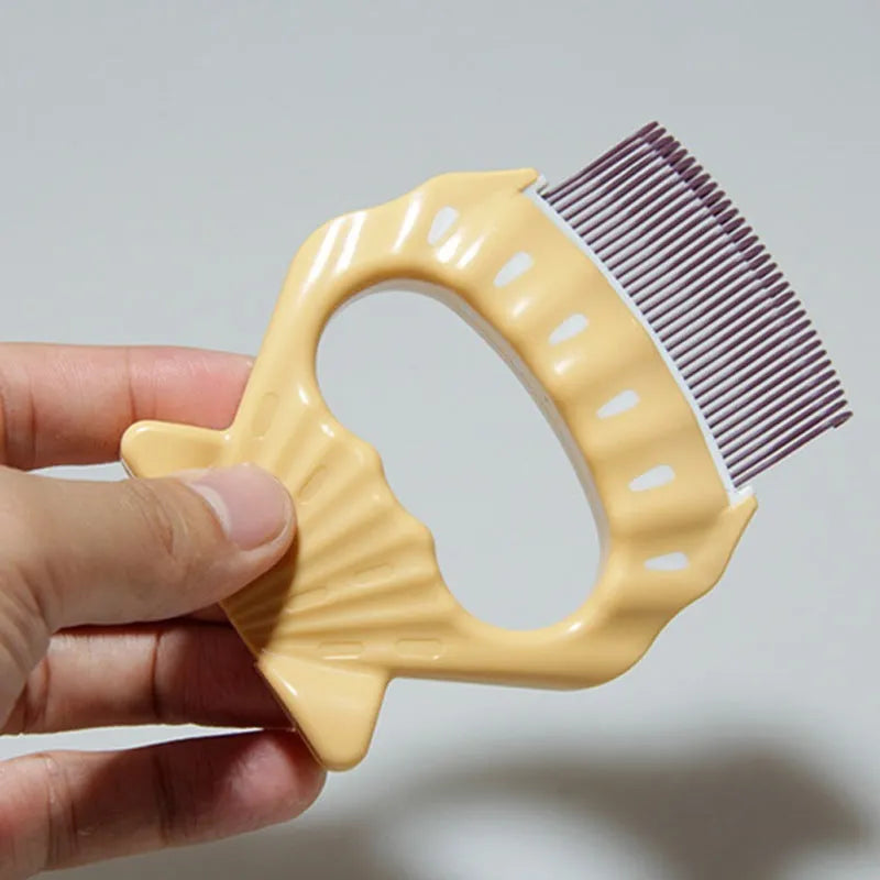 Shell-shaped pet grooming brush with bent wire bristles in green, orange and purple colour options