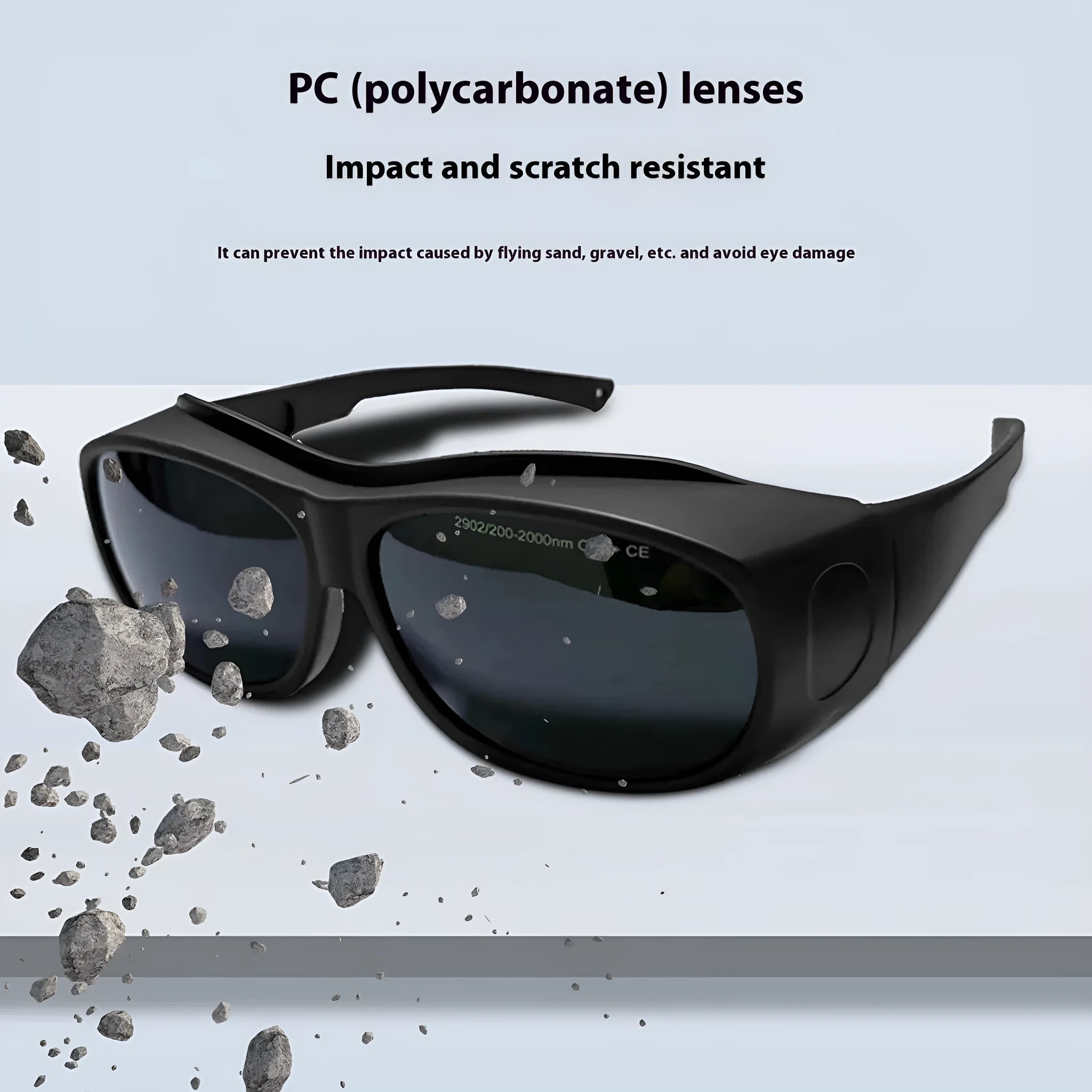 Pair of clear PC laser protection goggles for 200-2000nm wavelength, includes cleaning cloth.