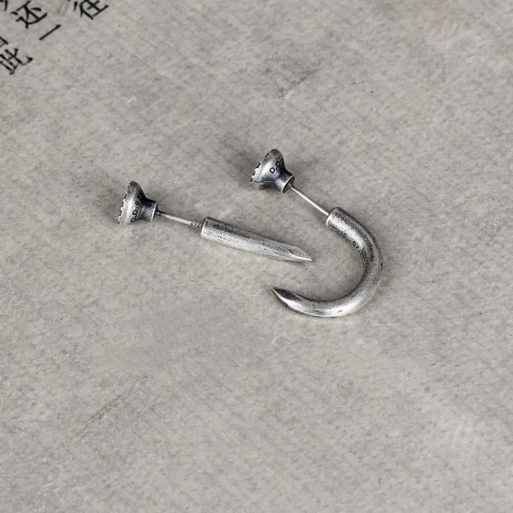 S925 sterling silver punk nail stud earring on ear hook, shown in straight and curved nail styles.