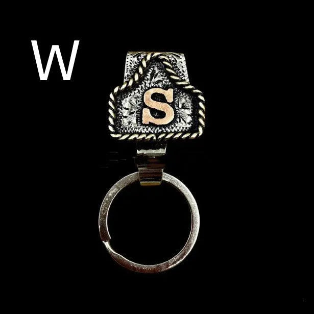 Handmade metal cow tag belt keychain in rustic design with multiple colour options