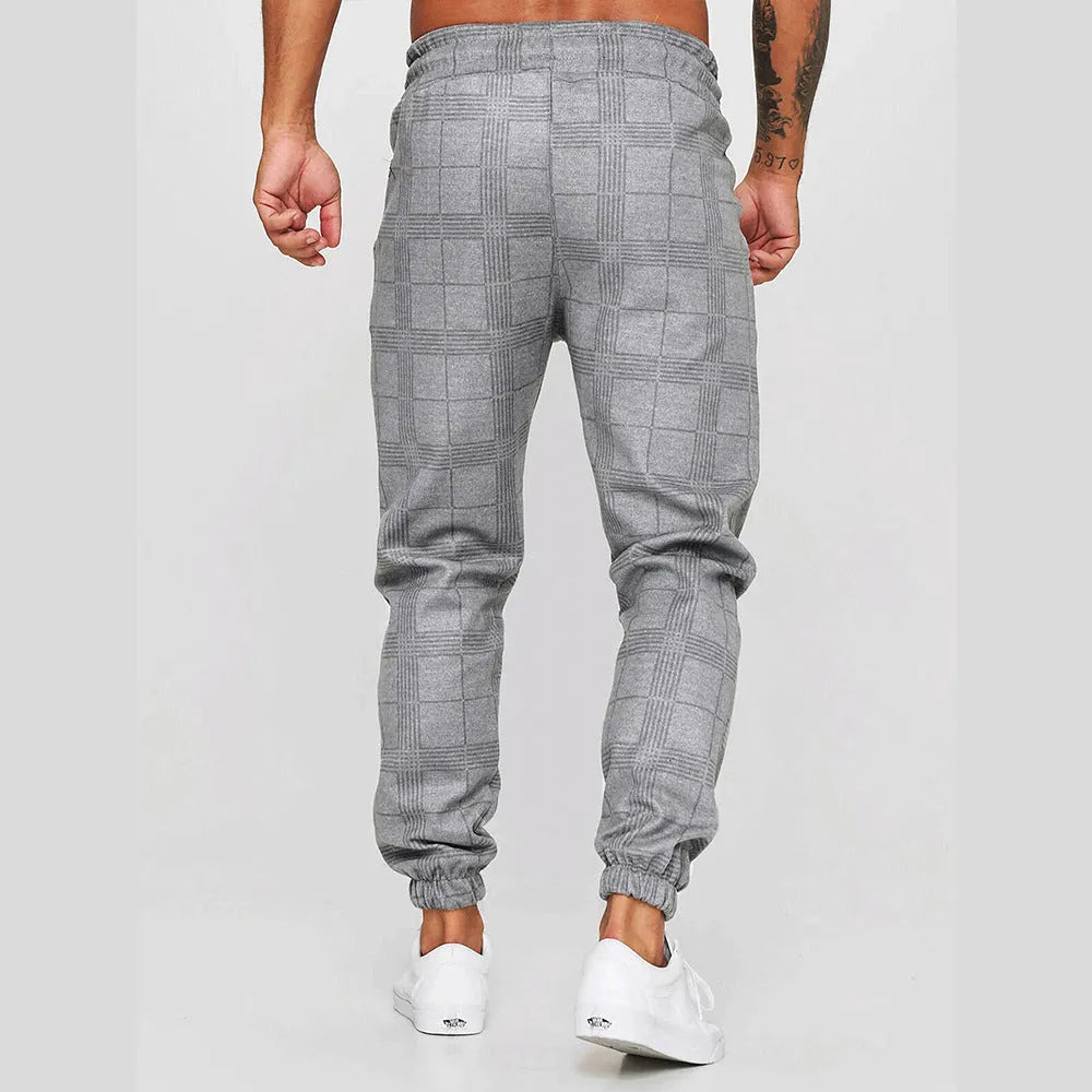 Cotton printed casual tapered trousers for men in black side view
