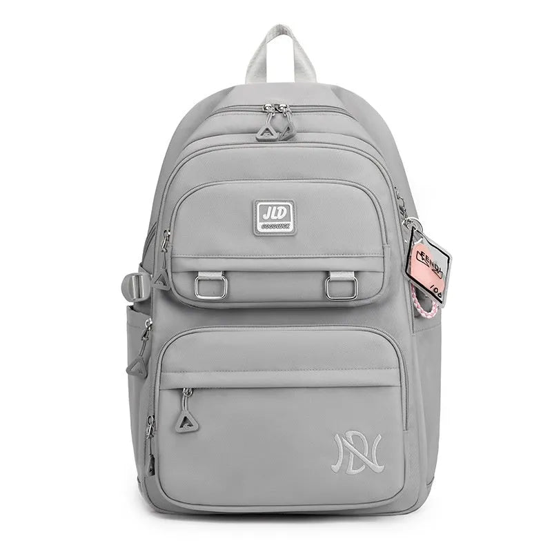 Girls large capacity nylon school backpack with anti-theft function and physiological curve back support