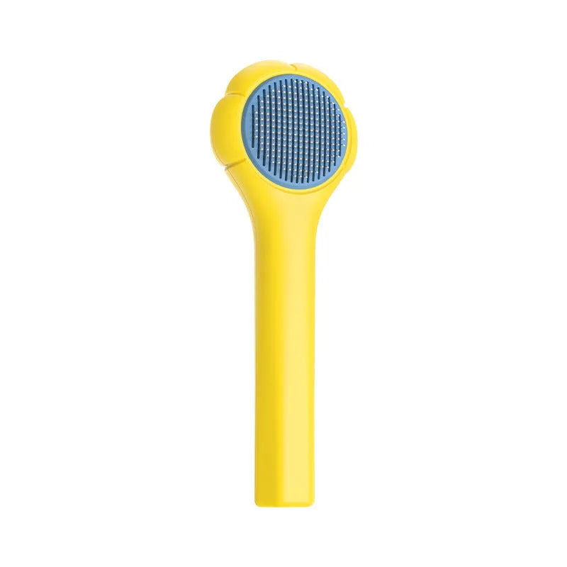 Floating needle comb for cats and dogs in green colour with ABS handle and steel teeth