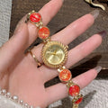 Women's quartz watch with round 25mm dial in one of six colours and zinc alloy case.