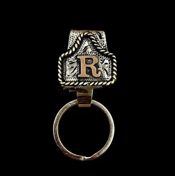 Handmade metal cow tag belt keychain in rustic design with multiple colour options