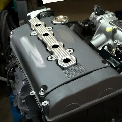 Aluminium alloy engine cover shown in red, blue, and silver colour options