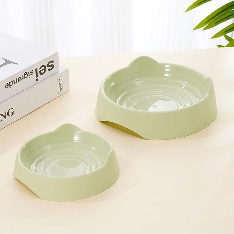 Ceramic dog slow feeder puzzle bowl in blue with non-slip base, shown in S and L sizes.