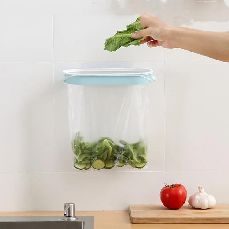Blue plastic kitchen garbage bag storage rack for cabinet organisation.