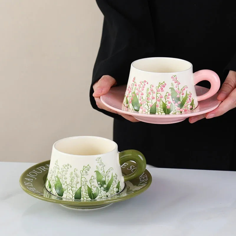 Ceramic coffee cup and saucer set for two with matching spoons in Campanula or Lanling Grass design