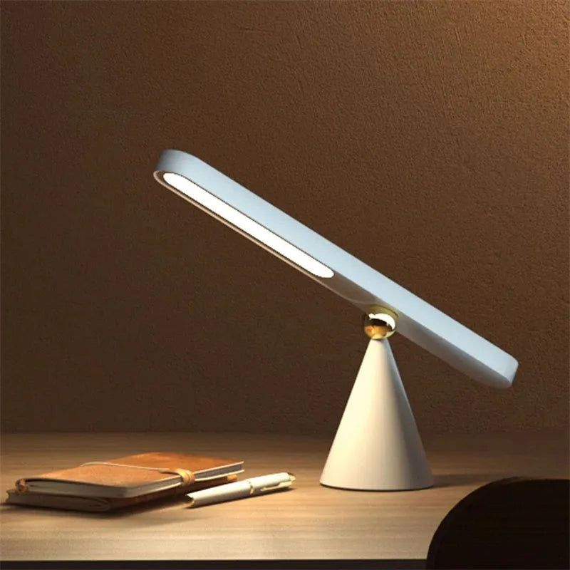Geometric khaki desk lamp with magnetic wall suction mount and USB cable