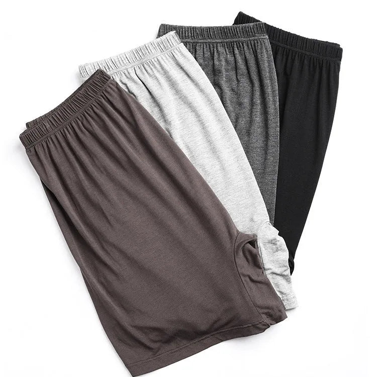 Men's solid colour high-waist boxer shorts made from modal fabric, shown in dark grey.