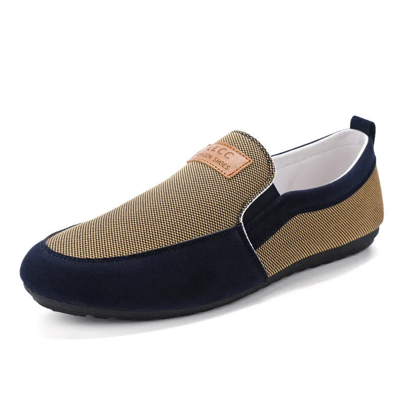 Men's grey canvas board shoes with round toe and rubber sole on a white background.