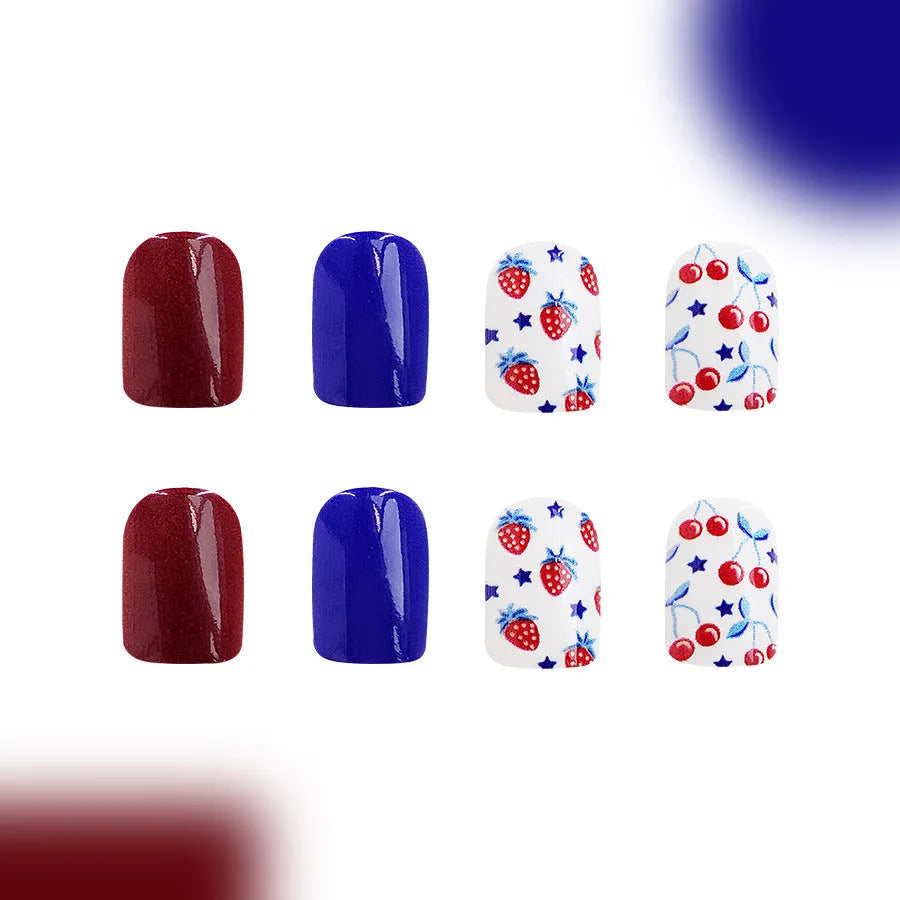 Short glossy red and blue strawberry cherry false nail stickers Independence Day themed 24 piece set.