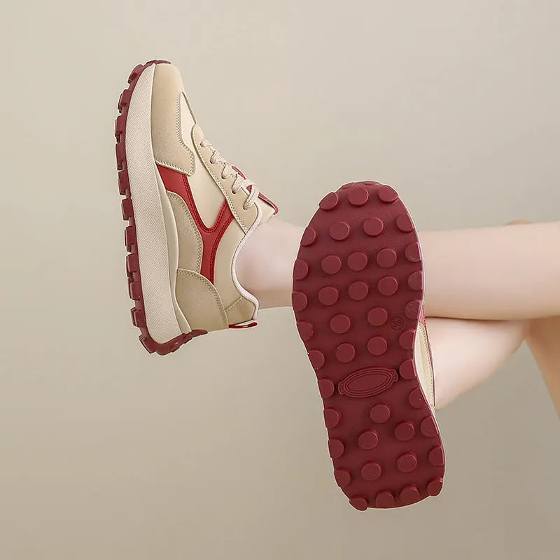Women's solid colour low-top platform trainers with lace-up front and flat rubber sole