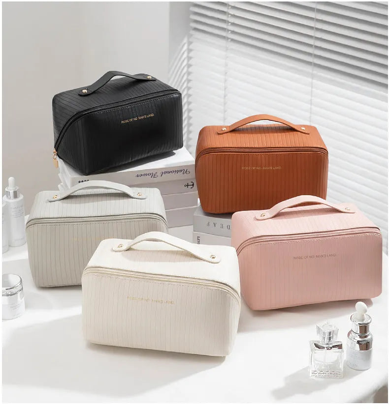 Vertical pattern cubic PU makeup bag in beige, shown with dimensions 22.5cm by 12.5cm.