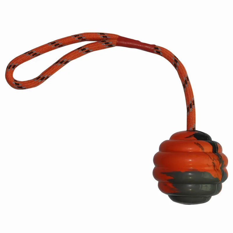 Multi-colour rubber dog chew ball with rope knot, measuring 6x30 cm.