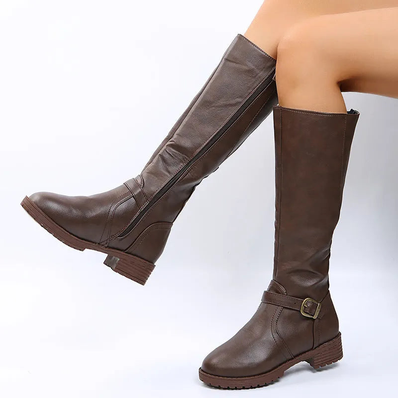 Women's black knight boots with square heel, round toe, and buckle detail on a high cylinder shaft.