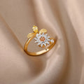 Gold and platinum coloured adjustable copper decompression ring with geometric rotatable design