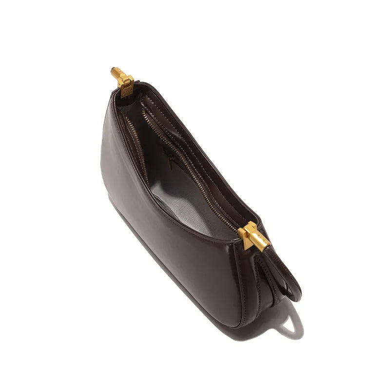 Women's oval retro underarm bag in PU leather with single strap and zipper compartment