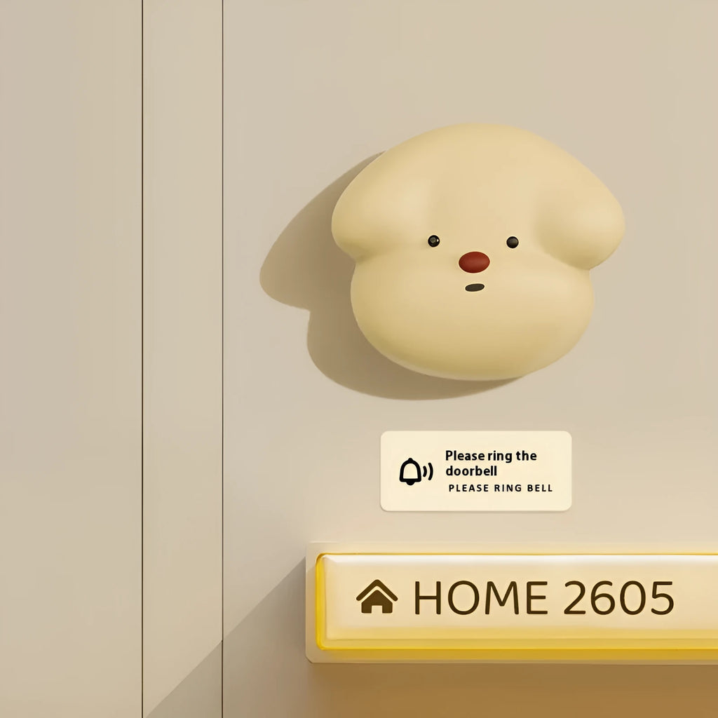 Plug-in wireless doorbell chime and self-generating battery-free button in milky yellow colour.