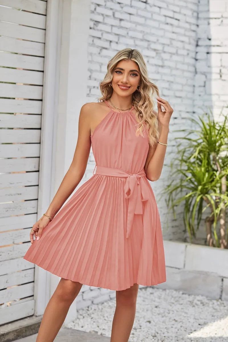 Women's black chiffon halter dress with pleated midi skirt and adjustable waist belt.