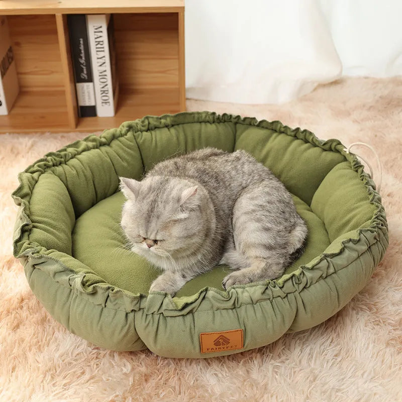 Grey and green reversible donut cat bed for indoor pets in small, medium, large sizes.