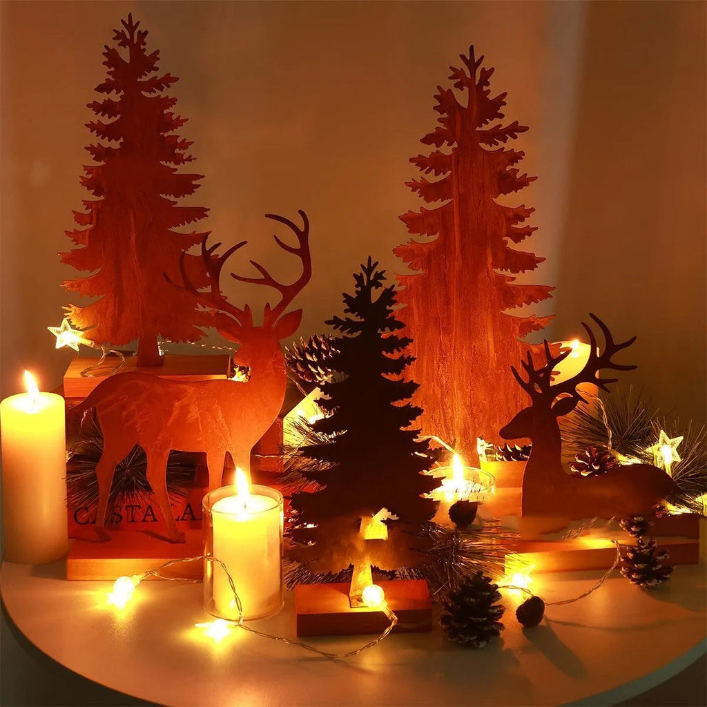Set of three rustic metal Christmas decorations featuring elk and tree figures