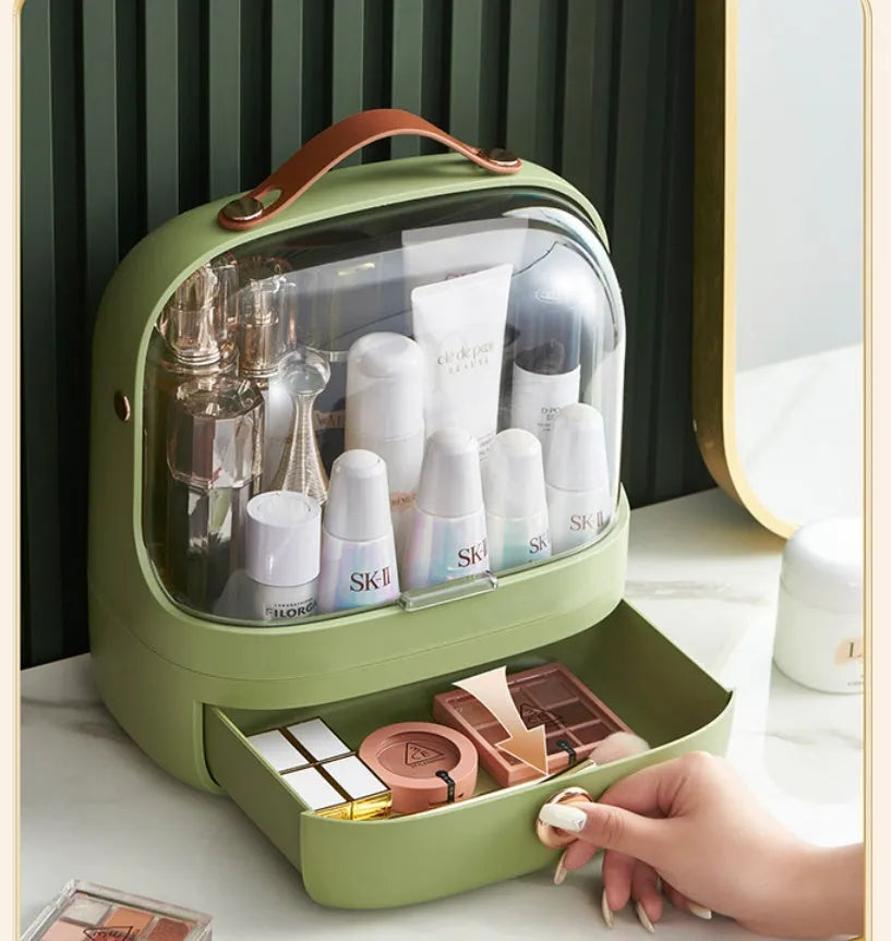 Desktop cosmetics storage box in PET hip material, dustproof, in green colour with lipsticks and blushes inside.