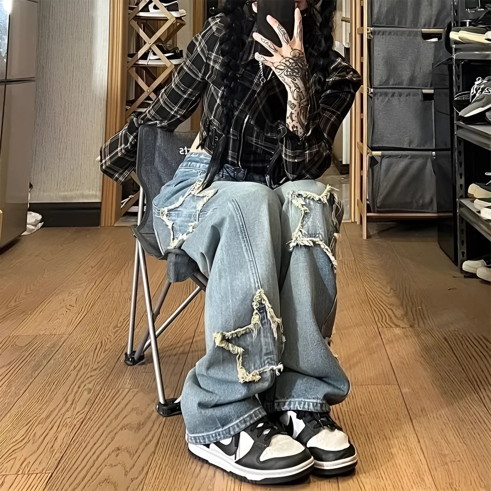 Blue high-waist wide-leg denim jeans showing straight cut design on mannequin