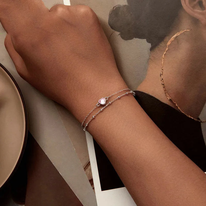 925 sterling silver bracelet with small heart pendant on an adjustable chain, BSB152 colour.