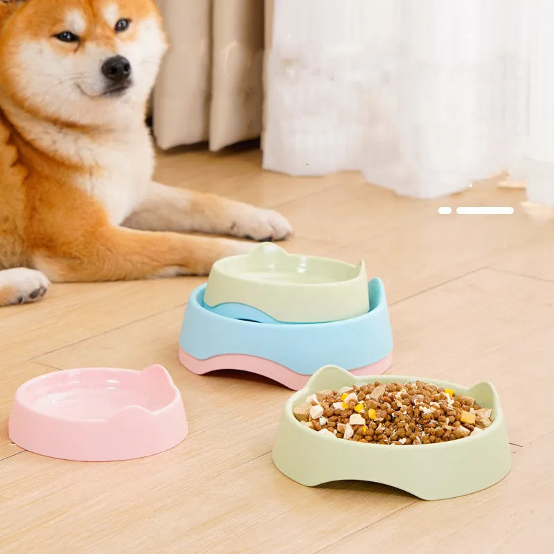 Ceramic dog slow feeder puzzle bowl in blue with non-slip base, shown in S and L sizes.