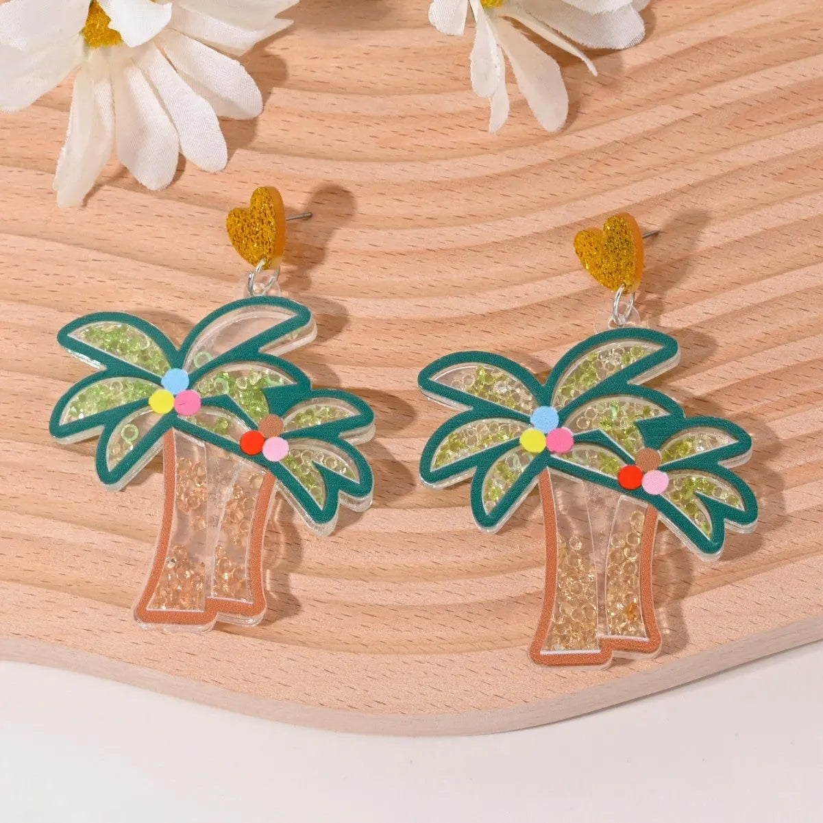 Colourful acrylic stud earrings with cherry, strawberry, watermelon, pineapple, coconut, cake, and ice cream designs.