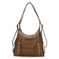 Women's PU leather shoulder messenger bag with zip compartments, available in black, brown or champagne