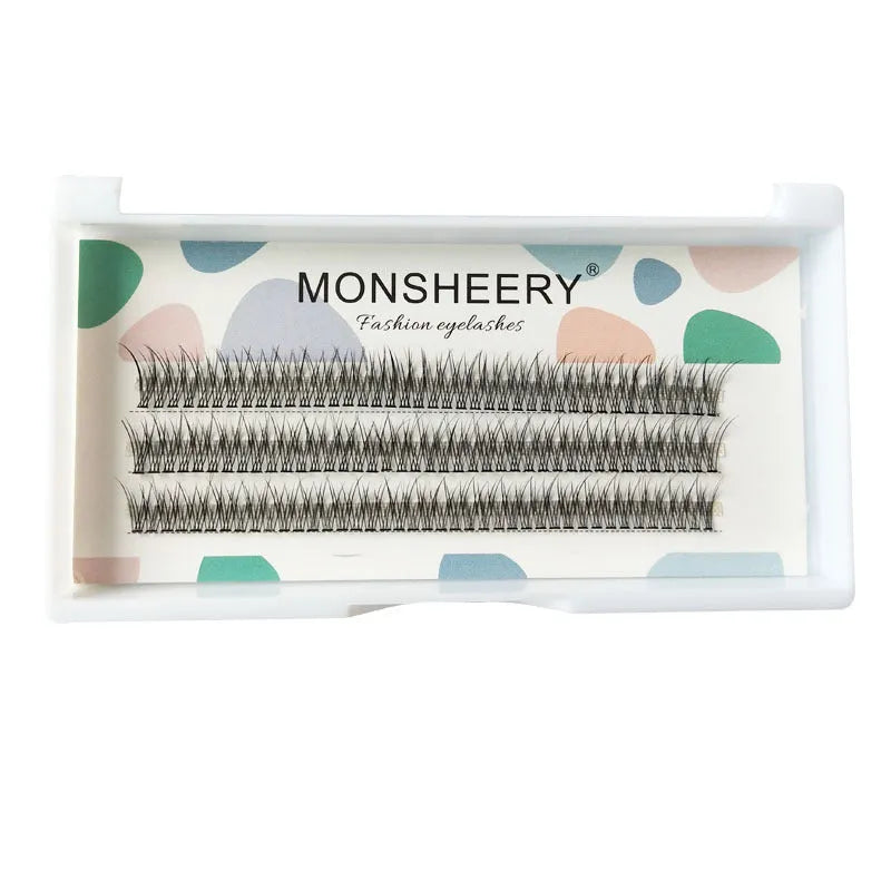 Black v-shaped fairy fishtail false eyelashes with thick segments on a white background.