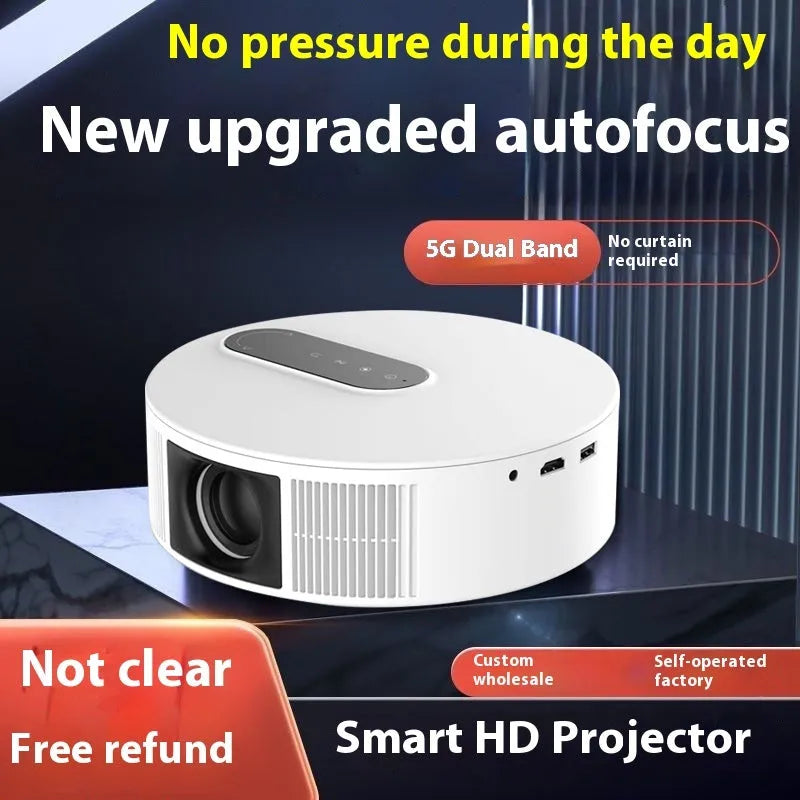 White HD 720p home theatre projector with remote control on a wooden table.