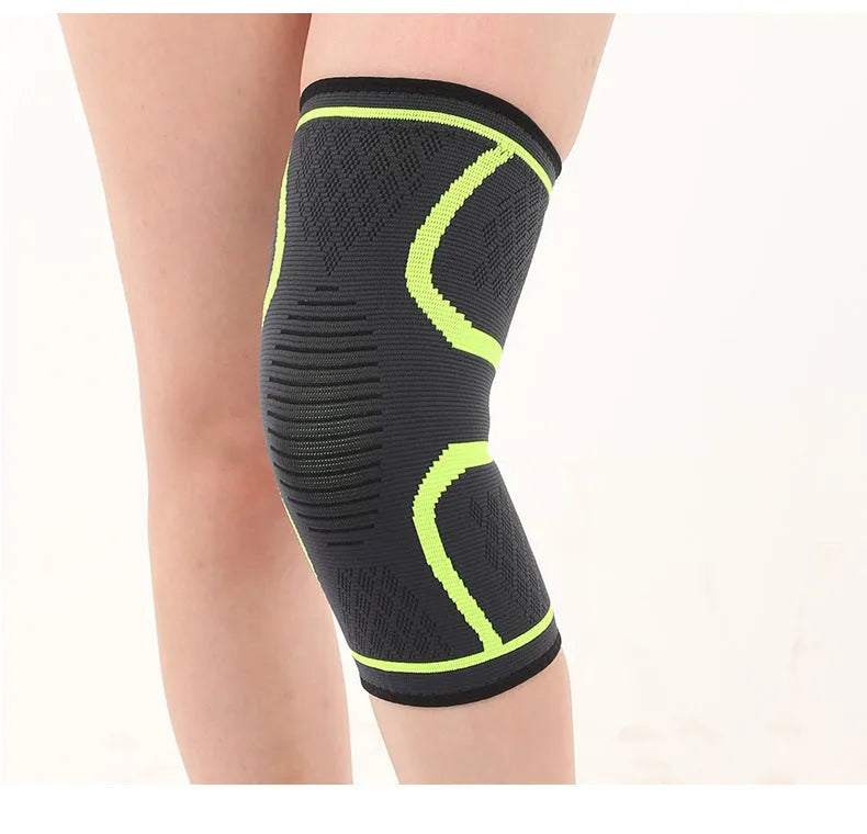 Pair of black stretch polyester sports knee pads with a textured non-slip interior.