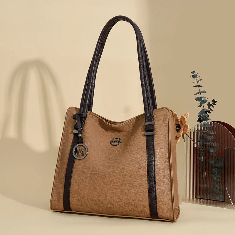 Women's large soft PU leather crossbody bag in retro style with double straps, shown in black.