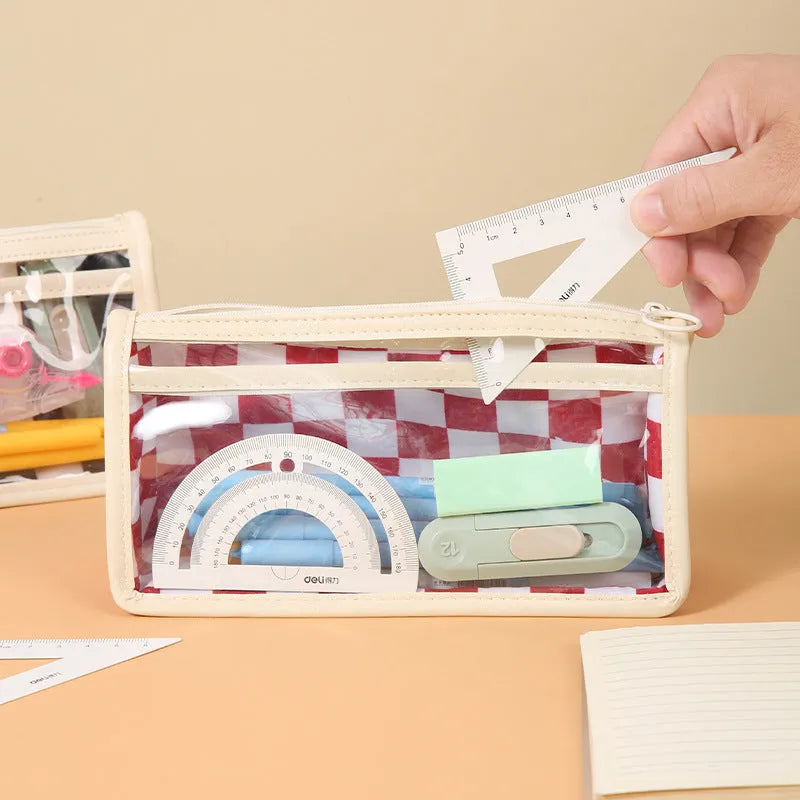 Transparent PVC pencil case with chessboard grid pattern showing pens inside