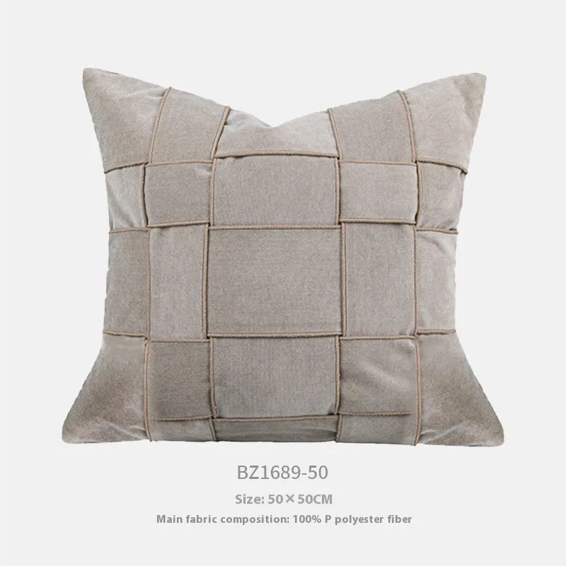 Square chenille woven cushion in a choice of colours, shown on a sofa, measuring 50x50cm.