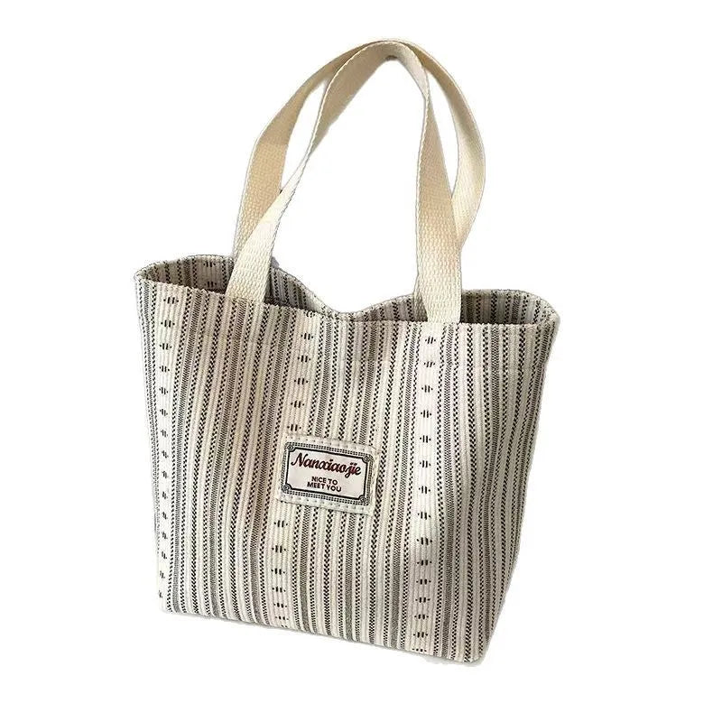 Japanese style corduroy shoulder tote handbag in dark brown colour showing textured fabric and large capacity design