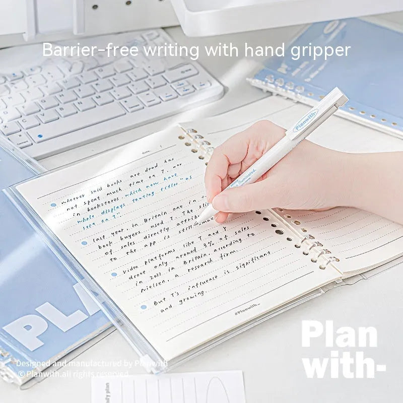 Blue and white A5 PVC spiral notebook with Wire-O binding on a flat surface