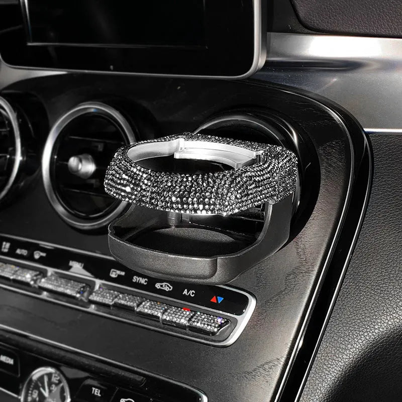 White diamond rhinestone car air vent cup holder bracket showing clip mechanism