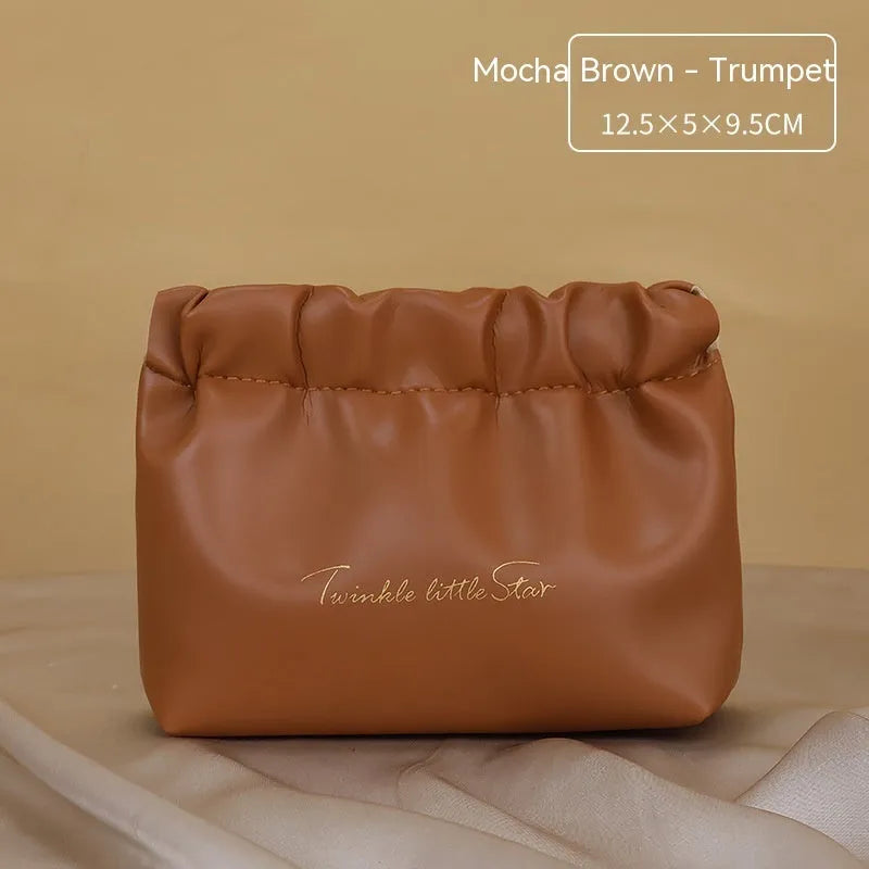 Leather travel toiletry bag in caramel mocha colour with dry wet separation compartments