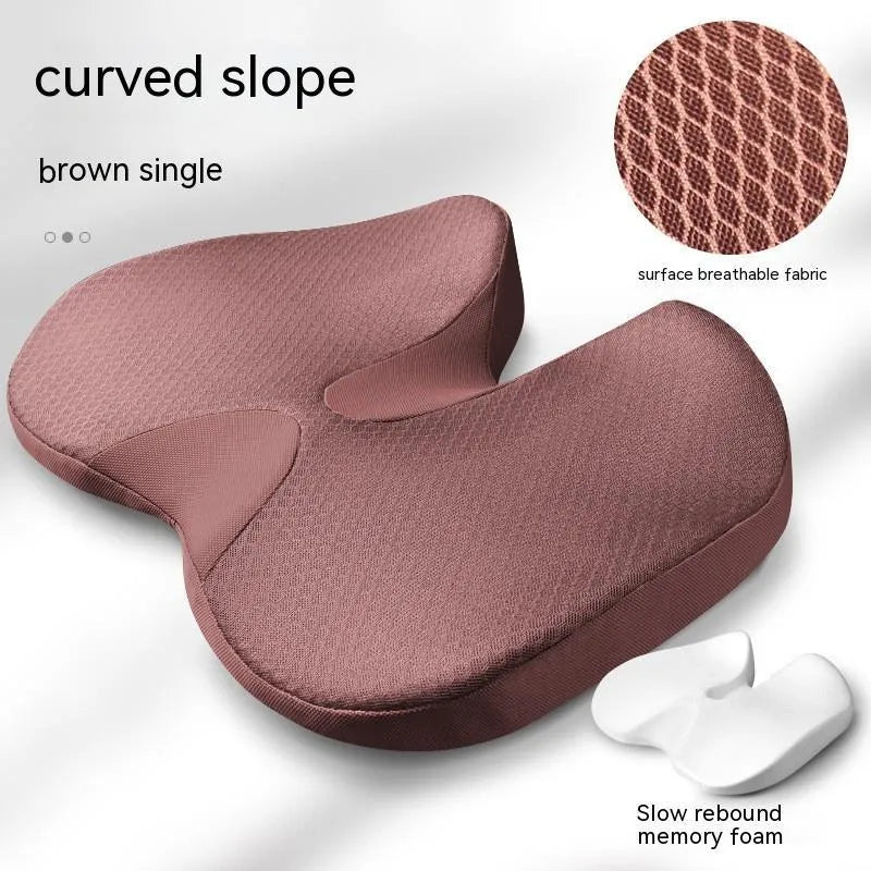 Curved memory foam seat cushion in beige with bevel design for tailbone support