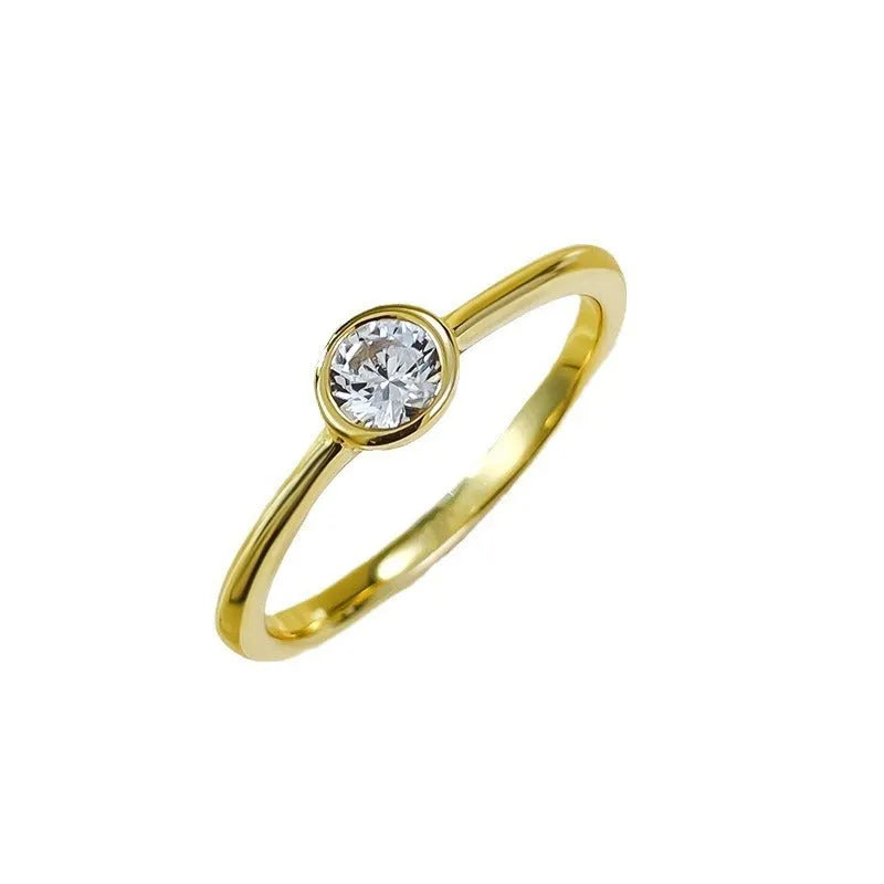 Minimalist silver crown-shaped ring with linear detailing in platinum or gold finish