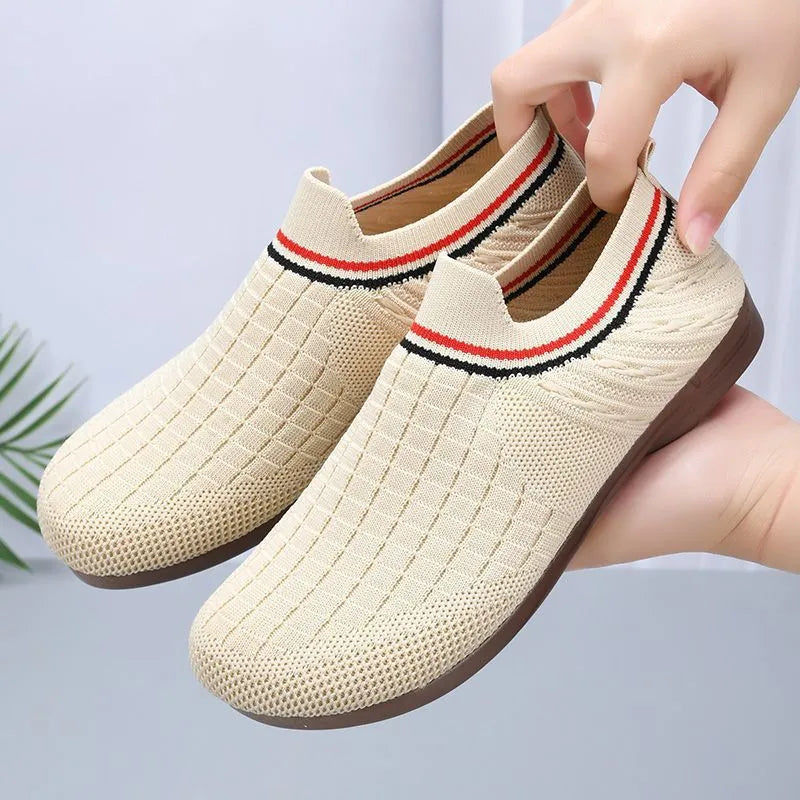 Women's casual slip-on shoes with breathable mesh upper, non-slip rubber sole, low heel, in black