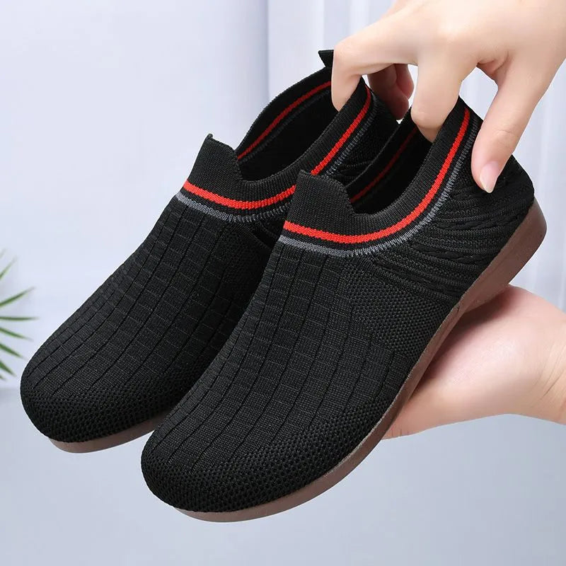 Women's casual slip-on shoes with breathable mesh upper, non-slip rubber sole, low heel, in black